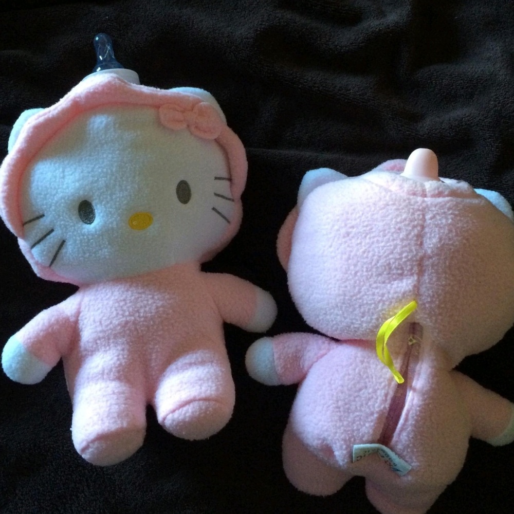 Hello Kitty suffed bottle/cup holder.